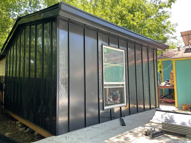 Black standing seam metal wall panels for Metal Roof Installation in Barre